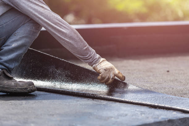 Professional Exterior Waterproofing technician working in Bourbon, IN